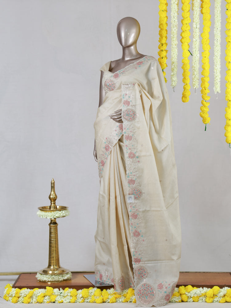 Ivory Blossom Embroidered Onam Saree