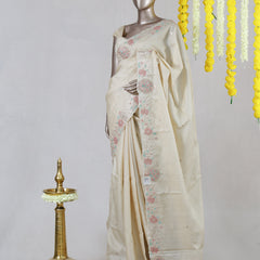 Ivory Blossom Embroidered Onam Saree