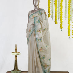 Ivory Aqua Blossom Embroidered Tissue Kota Onam Saree