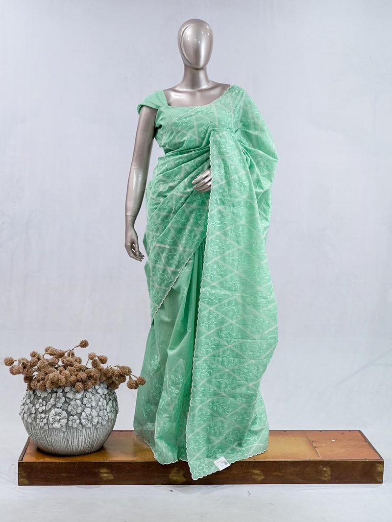 Pistachio green Geometrical embroidery raw cotton saree SAN5552